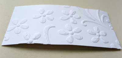 Top tip to avoid cracked embossing with coated papers